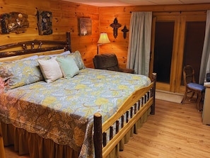 Basement ensuite King bed, workspace, and laundry for a perfect stay.