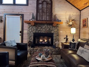 Indoor fireplace ready for your enjoyment from October-March.
