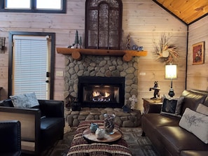 Indoor fireplace ready for your enjoyment from October-March.