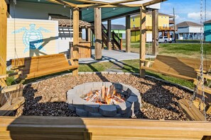 A fire pit burning for you to stay with us!