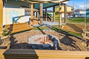 A fire pit burning for you to stay with us!
