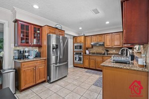 Functional kitchen with complete kitchen essentials