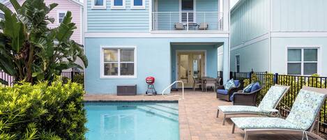 Pool with lounge chairs exclusive use to the guests