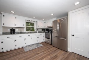 This kitchen is fully equipped, ready for you to whip up gourmet meals or simple snacks