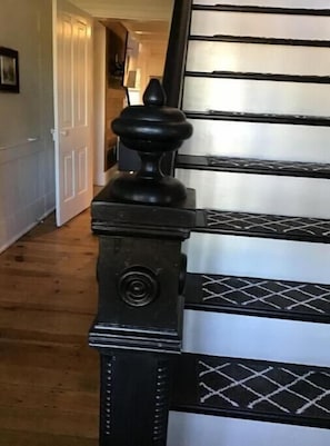 A			front hallway and original staircase.