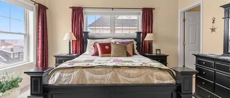 Primary bedroom with a queen-size bed and ensruite bathroom