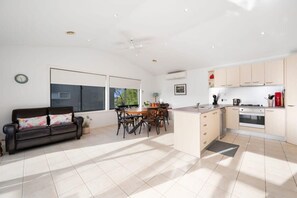 Overseeing all activity, the kitchen is a hub of convenience and style