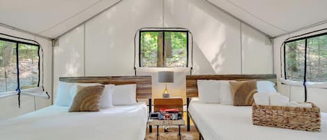 The Glamping tents are for the guests that want to tent, but don't want to rough it. The tents include linens, electricity, coffee bar, grill and beautiful view.