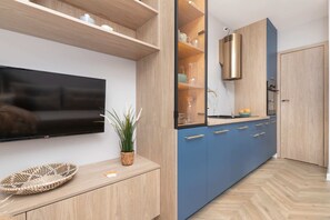 The living area offers a perfect blend of comfort and modern style. 