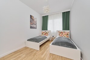 The bedroom's elegant decor creates a serene and restful environment.