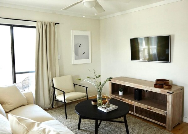 Indulge in ultimate relaxation and comfort in this cozy living room retreat