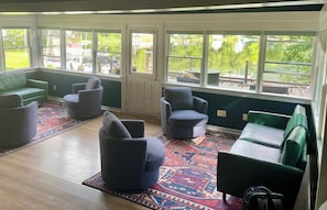 Family room overlooking deck and lake