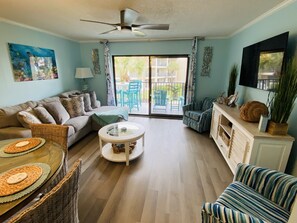 Living room with balcony/ocean views