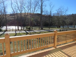 Patio deck with chairs for relaxing by river