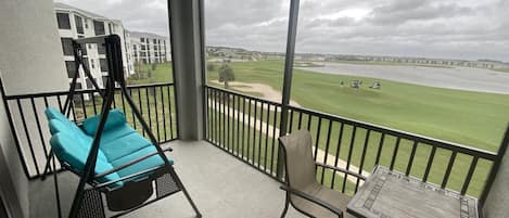 Rare lanai w screen on 2 sides overlooking hole 9 &  west and water!! A SWING!