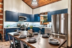 Kitchen and dining big enough for your whole group.