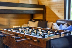 Engage in lively competition with our foosball table for a dose of friendly fun and entertainment.