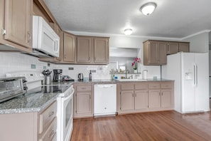 Fully equipped and stocked kitchen.