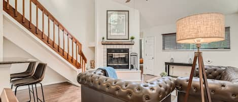 Living Room - Fireplace, Skylight, and Ceiling Fan