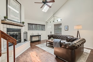 Living Room - Fireplace, Skylight, and Ceiling Fan