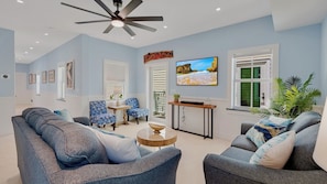Flat screen TV and plenty of seating in the living area...