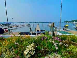 Our lakefront patio, perennial garden and our dock.