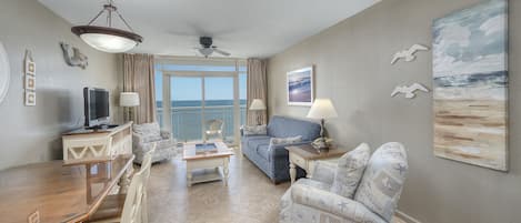 The ocean front living room is well-appointed with comfortable furnishings.