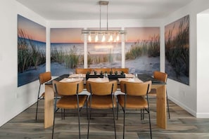 Step into our beautiful dining room and take a seat at the table that comfortably accommodates 8 guests. You'll love the warm and inviting atmosphere!