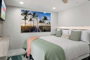 The master bedroom is designed to provide guests with a comfortable and relaxing space to unwind after a long day of activities.