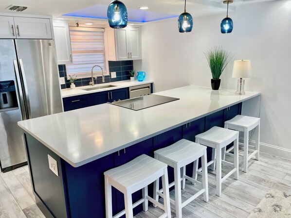 Watch the seashore in this fabulous state of the art kitchen! Waffles & waves.