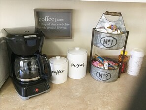 We supply coffee, condiments, and even take out cups to keep our guests awake!