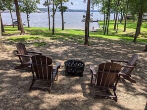 Gather around the firepit, perfect for s'mores, stories and lakeside serenity.