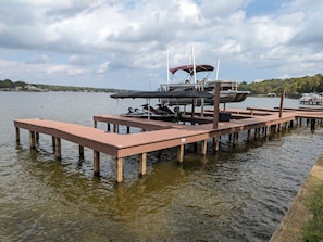 Your personal gateway to lake adventures; this private boat dock and boat slip.