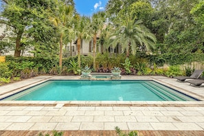 Heated pool and spa with lounge seating