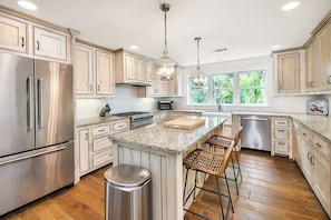 Chef's kitchen with a gas range