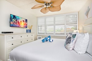 Relax in the bedroom with a King-size bed and a flat-screen TV!