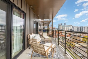 Large spacious patio off the living room and primary bedroom offering a gorgeous view of Music City!