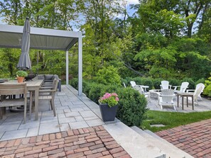 View of pergola and patio.