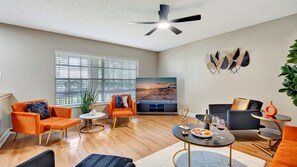 Our vibrant and inviting living room, where style meets comfort!