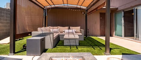 Covered outdoor seating by the pool