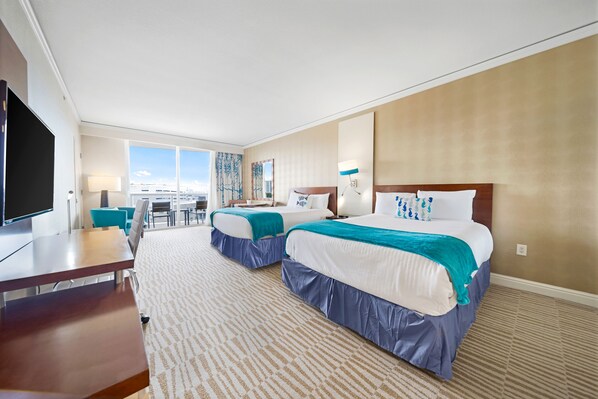 The studio is equipped with two queen-size beds, private balcony and HD TV