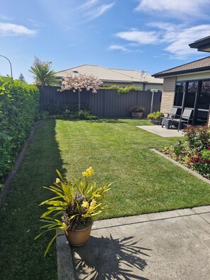 Sunny private back yard.