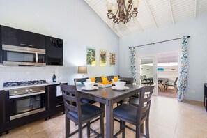 A dining area that can serve 4 people with  a fully equipped kitchen.