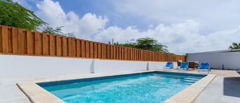 Dive into relaxation in this stunning pool area