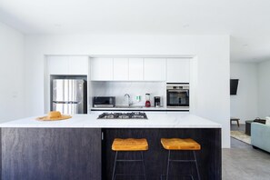 Delicious memories start here: Create lasting moments in this inviting kitchen.