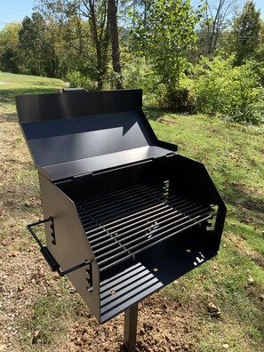 Built-in charcoal grill, charcoal available for purchase nearby