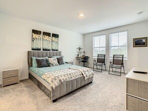 Spacious and comfortable room with sunlight and good ventilation.