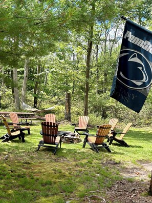 Relax around campfire, enjoy a meal on picnic table, or snooze on the hammock.