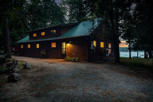 Welcome to The Dragonfly Cottage, a cozy lakefront retreat nestled among the trees. Enjoy the rustic charm, warm lighting, and peaceful ambiance, with direct access to Intermediate Lake just steps away from your door.