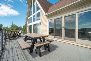 Top deck spans the entire house with plenty of seating.